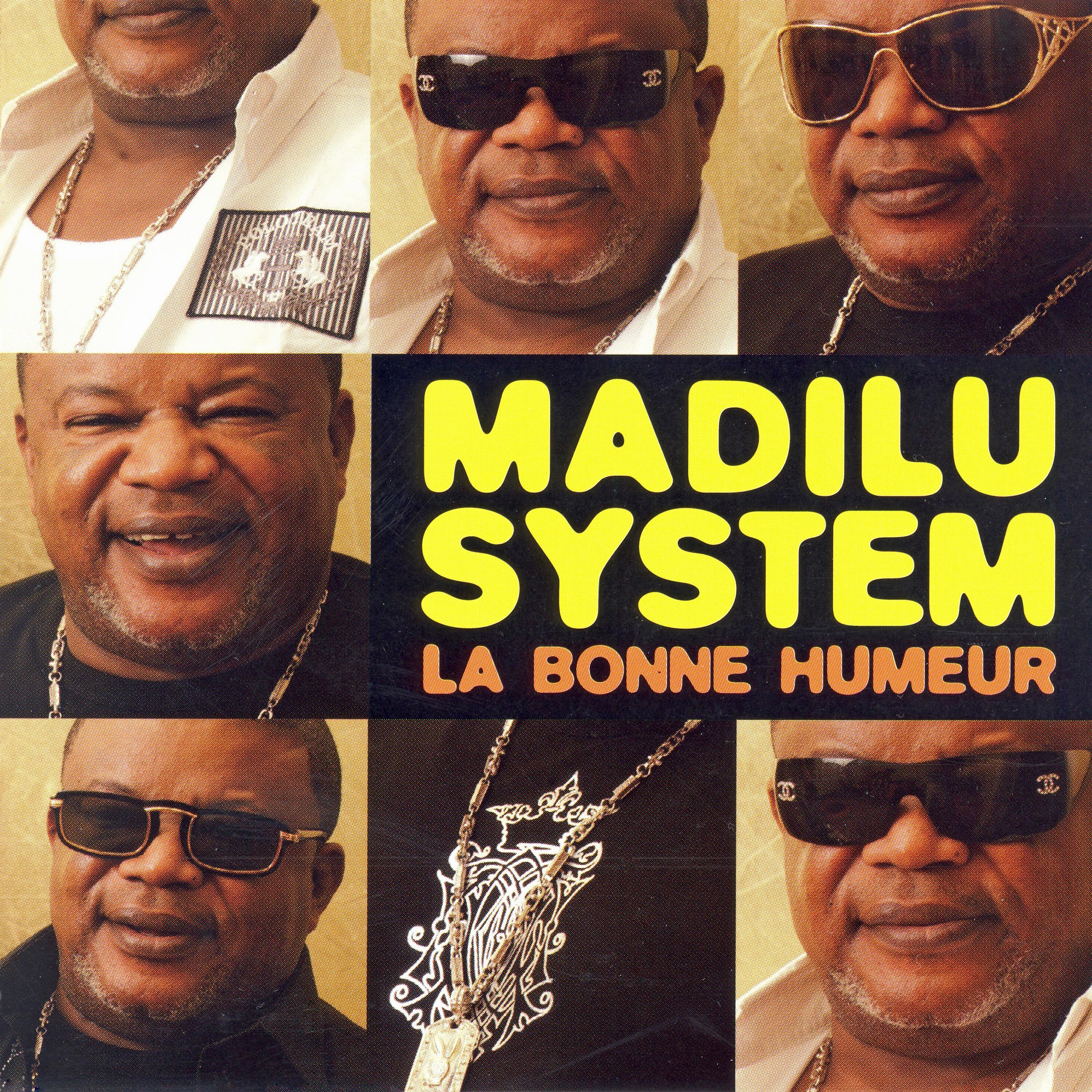 MADILU SYSTEM - L'heure c'est l'heure